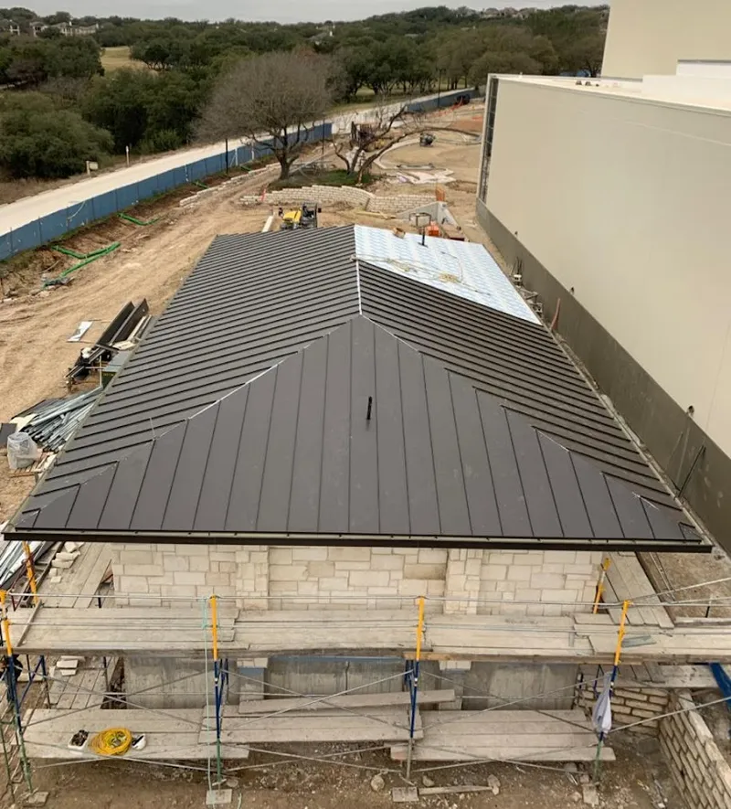 Metal roof new construction with scaffolding in Potsdam