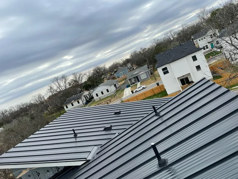 Standing seam metal roof panels with vents for Skylight Repair in Potsdam
